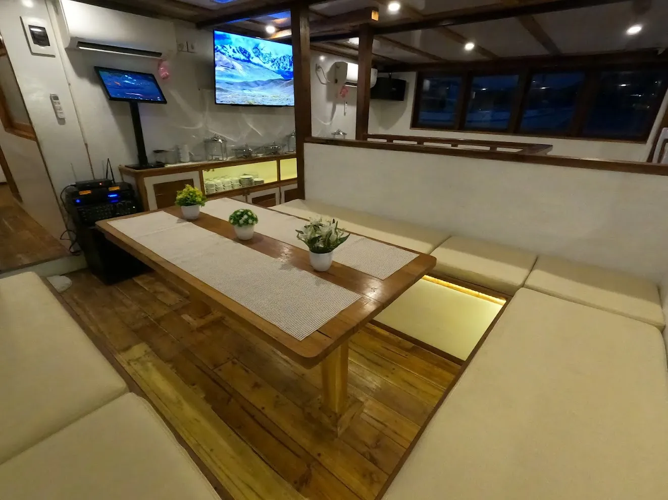 Air-conditioned indoor saloon and dining area on board