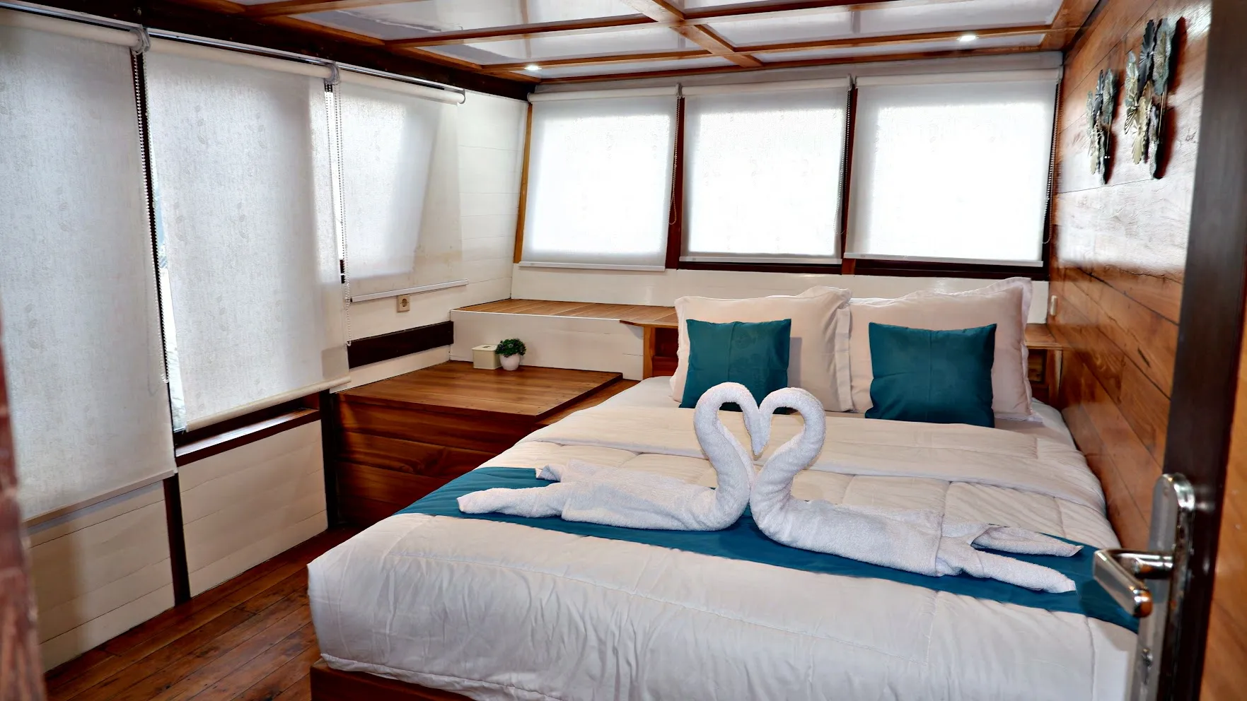 Master cabin with double bed and sea-view windows