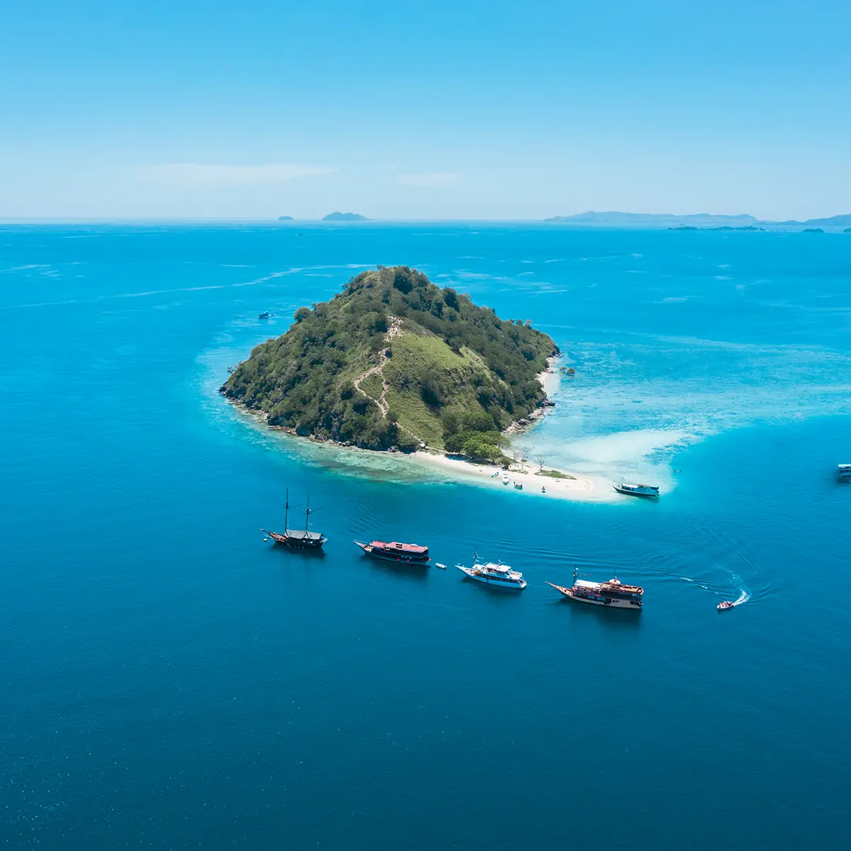 Aerial view of Kelor Island and its fringing reef