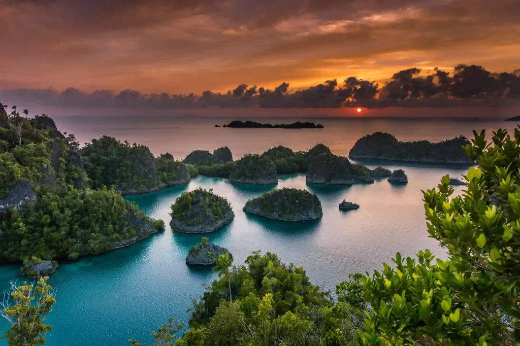 The Piaynemo viewpoint over Raja Ampat karst islands at sunset